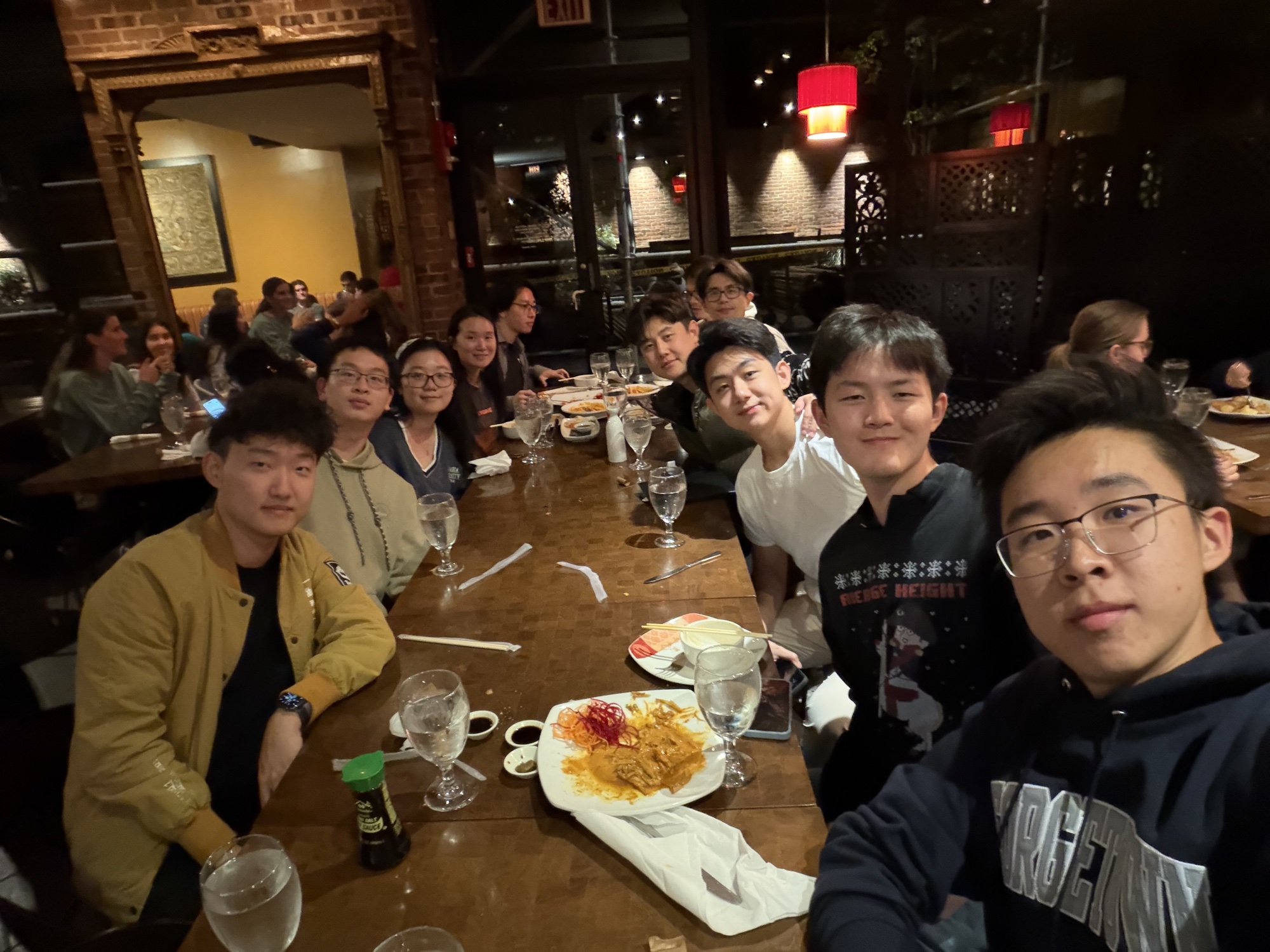 Friends sharing dinner around a restaurant table
